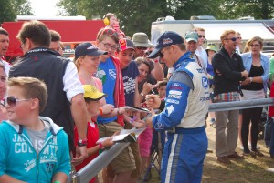 Petter Solberg signing autographs at Carfest